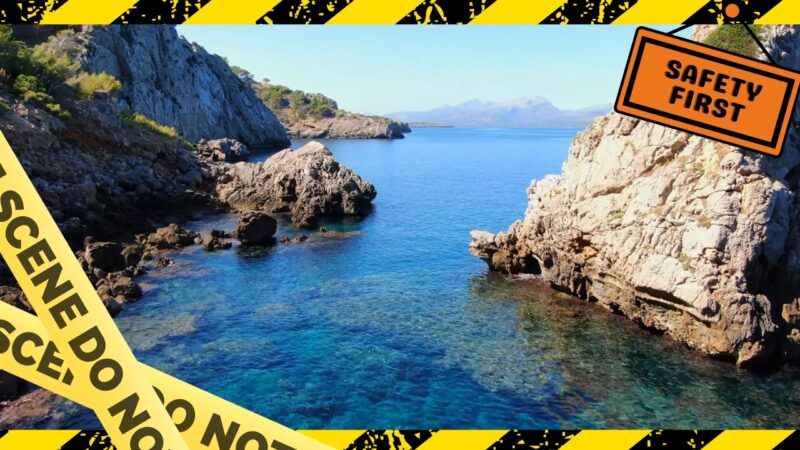 image is framed with caution tape and a "Safety First" sign, hinting at a warning or safety concern related to the location in spain Mallorca