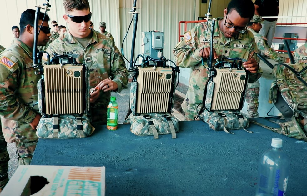 Cyber corps soldiers working with communication equipment