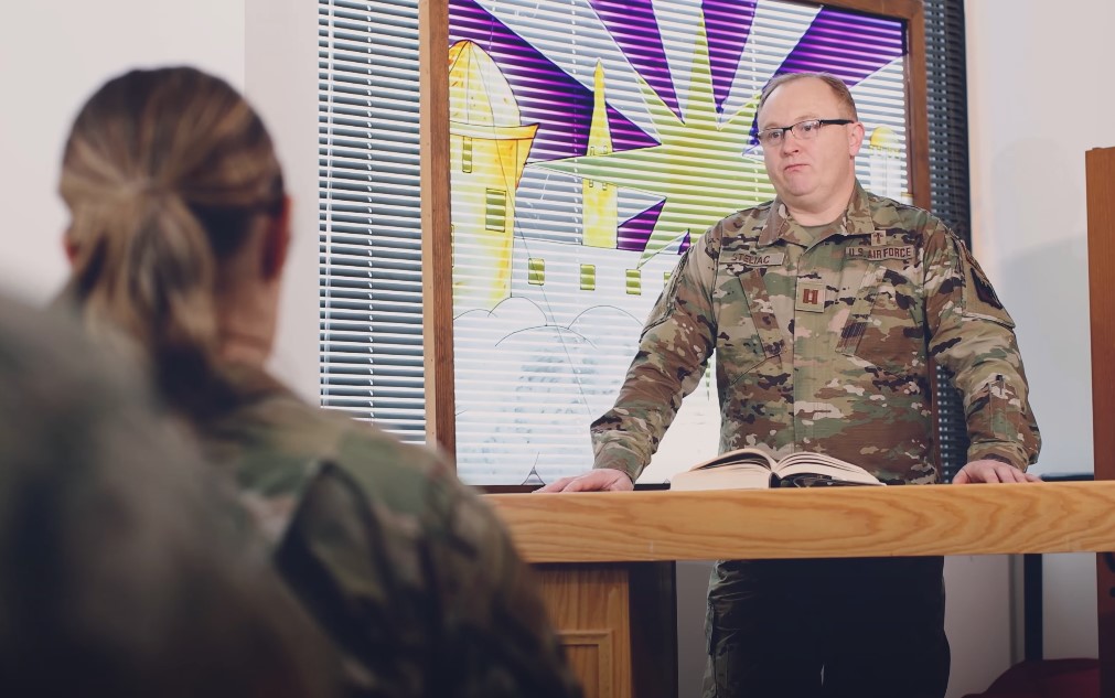 Soldier consulting with member of Chaplain Corps