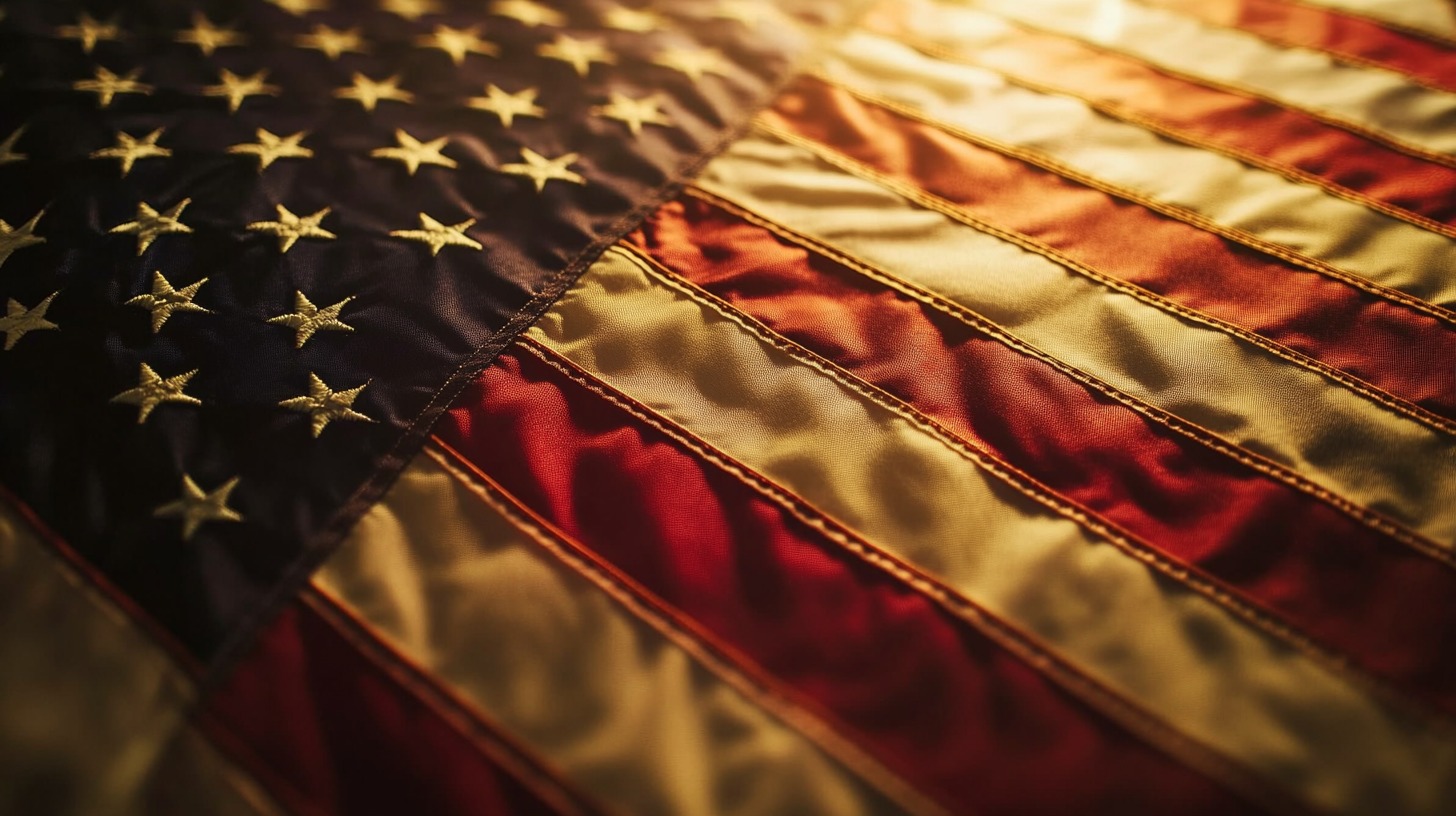 detailed close-up of the American flag, showcasing the vibrant red, white, and blue colors along with golden stars on the blue field