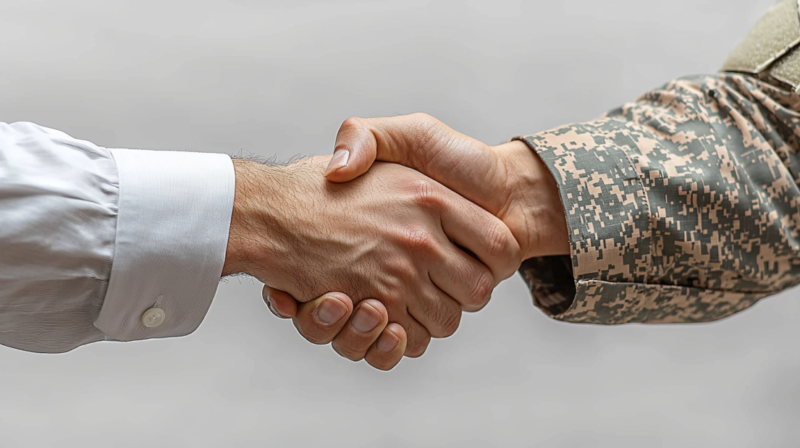 A Handshake Between Military Officials Symbolizing the Strengthening of The U.S.-Peru Military Partnership