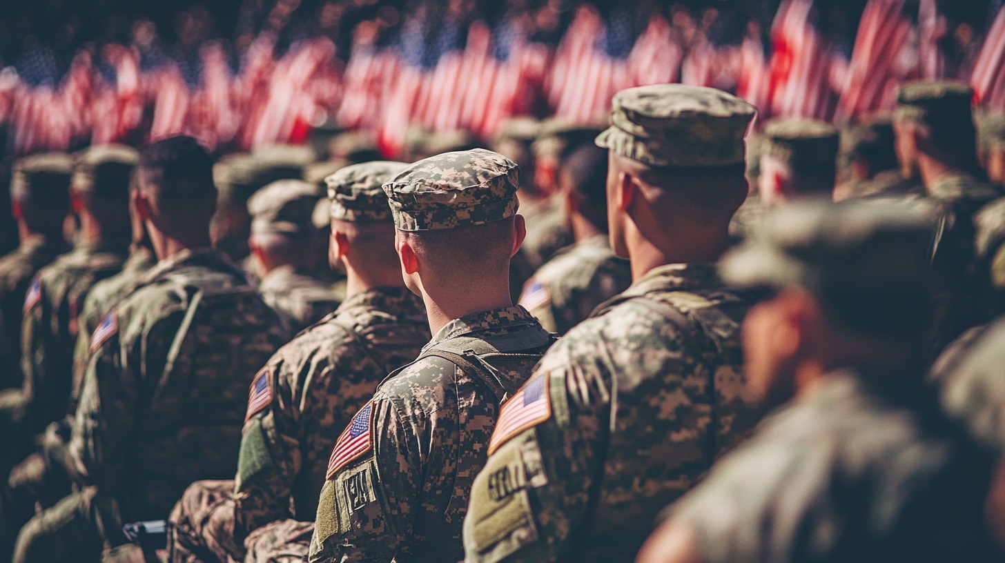 group of soldiers in camouflage uniforms standing in formation, with American flags displayed in the background