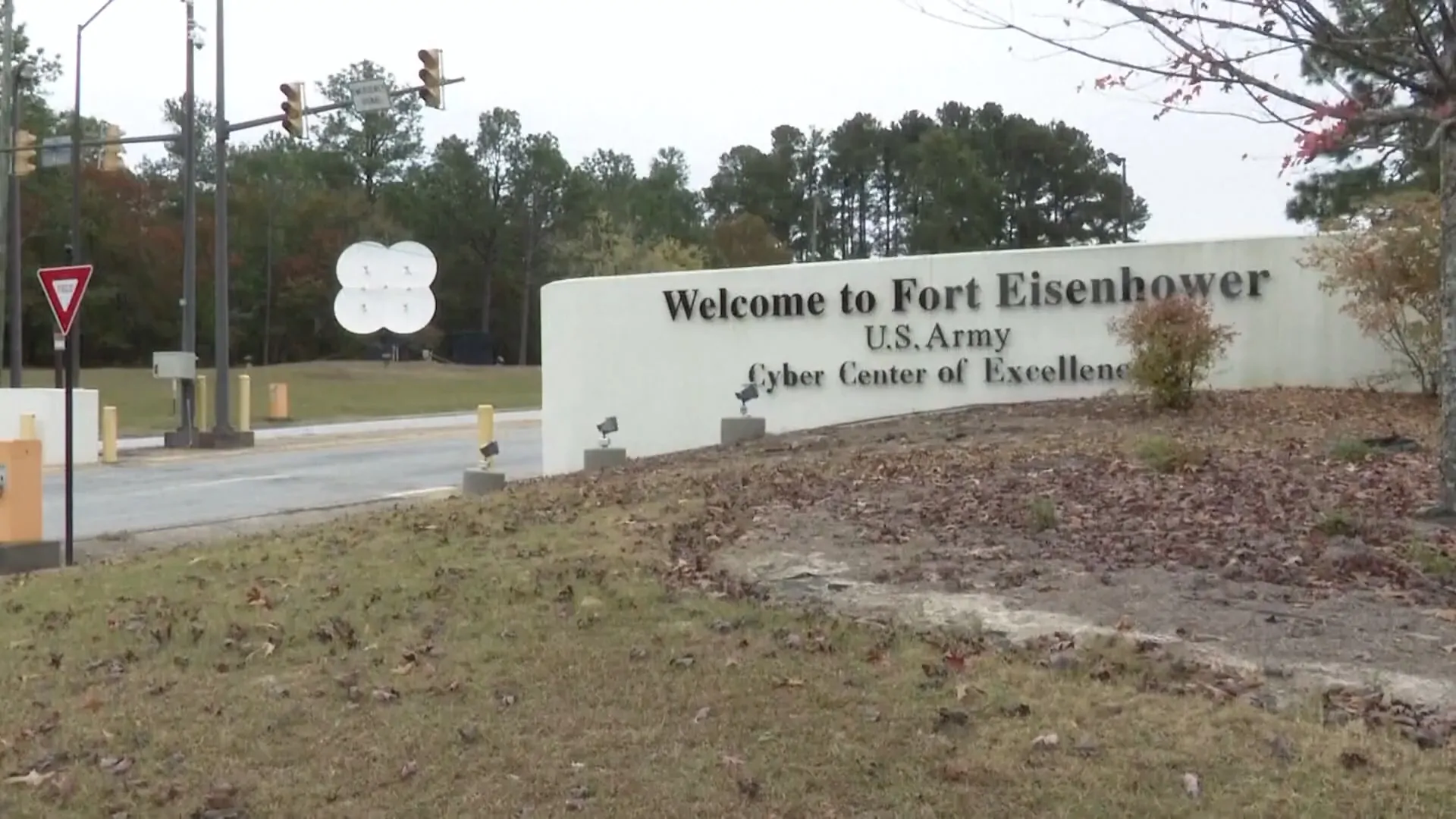 Entrance sign at Fort Eisenhower with 'U.S. Army Cyber Center of Excellence' written on it.