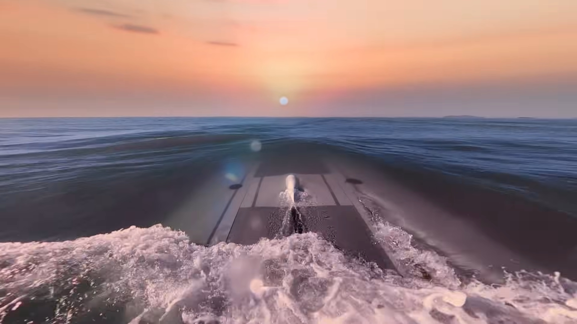 An unmanned underwater vehicle emerging from the water with a picturesque sunset in the background