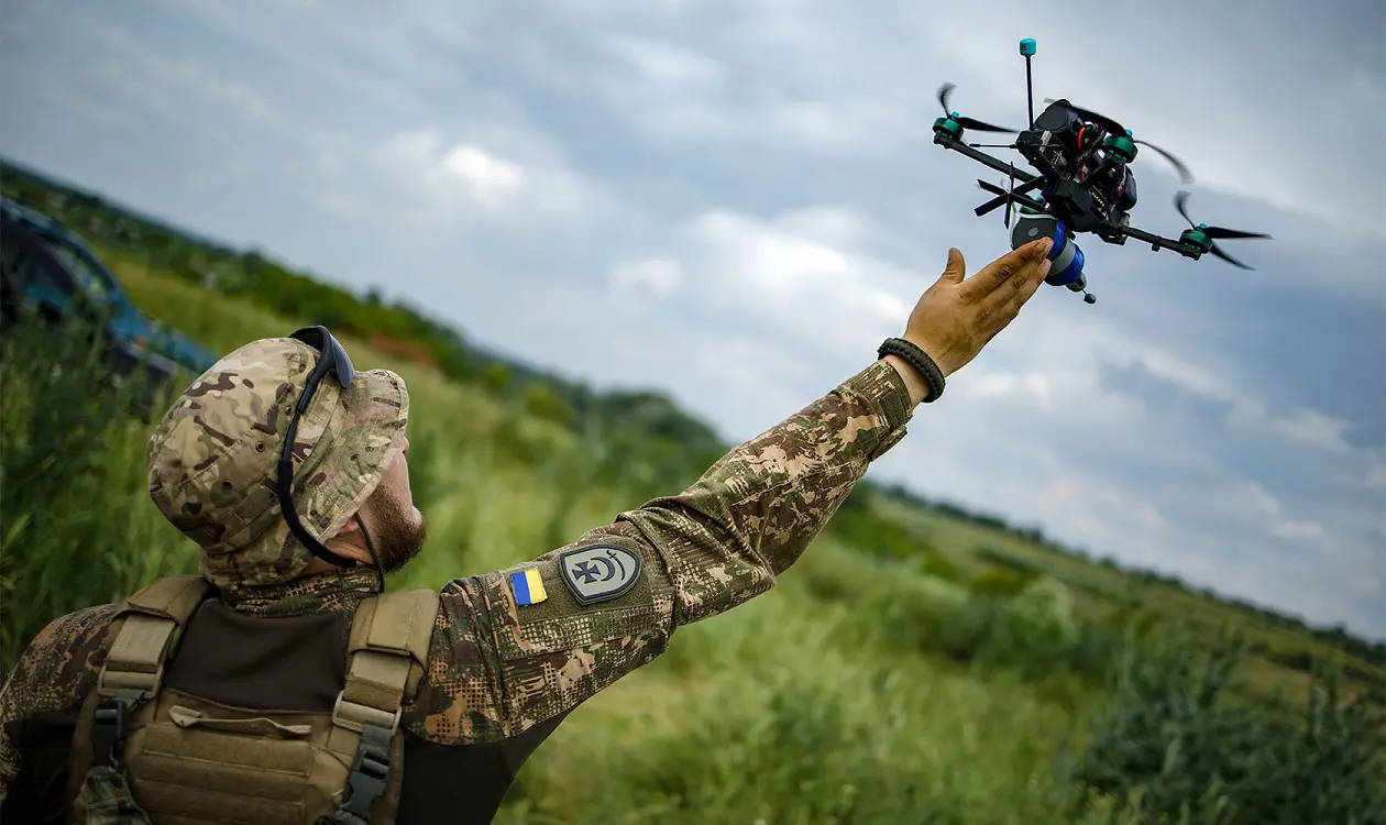 High-performance drones racing on colorful tracks, emitting a futuristic vibe with neon lights and dynamic motion trails.