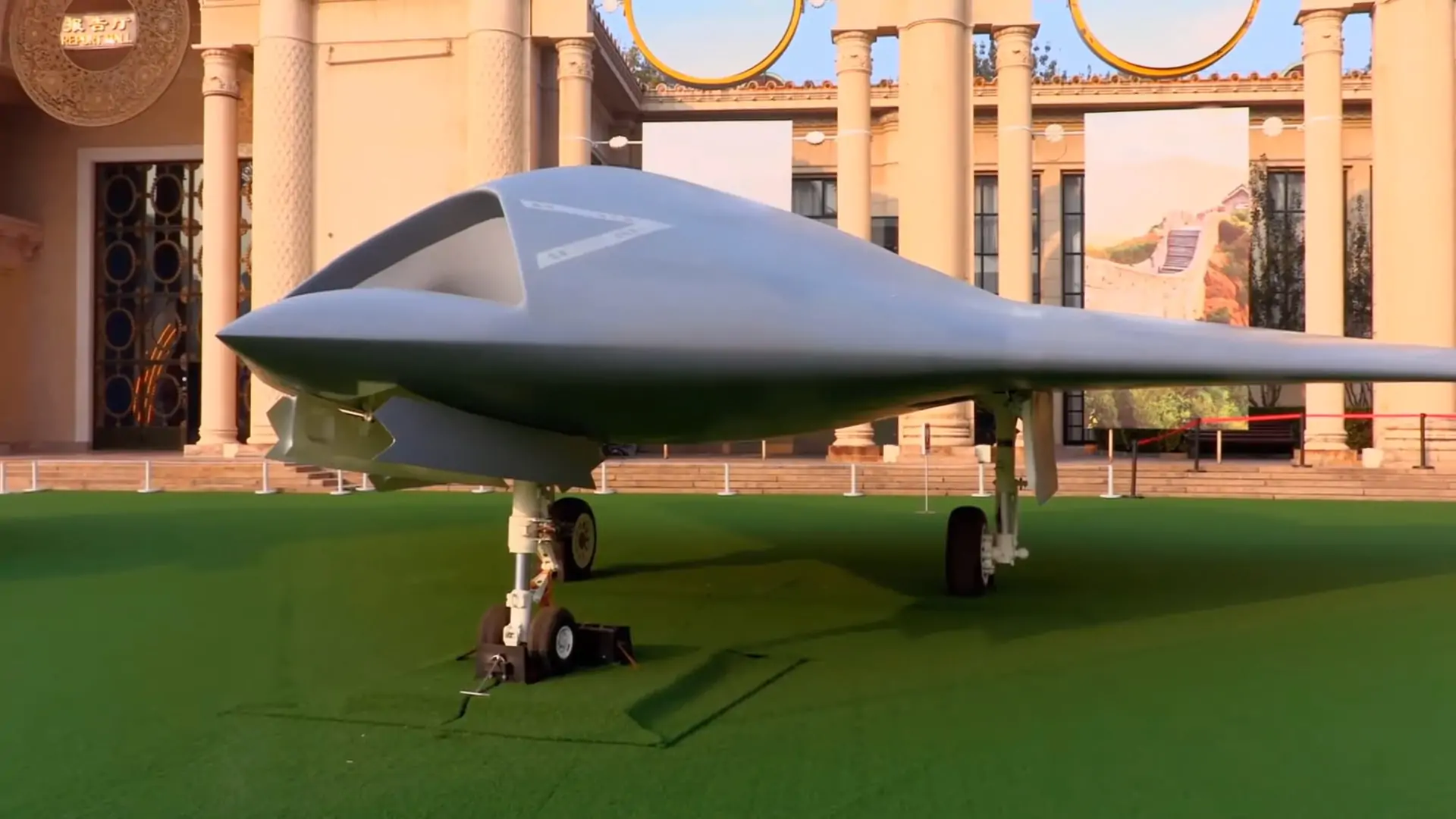 GJ-11 Sharp Sword UAV on display in front of an ornate building