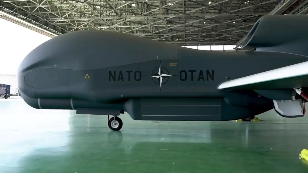 Close-up of the NATO-labeled RQ-4 Global Hawk UAV in a hangar