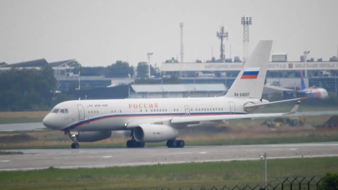 Russian Tupolev Tu-300 aircraft on a runway with airport buildings in the background